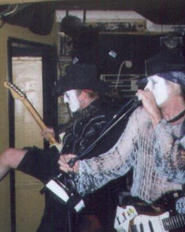 1999 Ginger Wildheart and Alex Kane kick holes in the stage wall (but they paid for the damage)